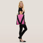 Abstracte geometrische vorm in zwart-wit en neonro tote bag (Op model)