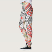 Abstracte gestreepte folkethno triba met sierbekle leggings (Links)