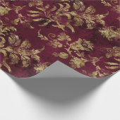 Abstracte goudbloemen op rood cadeaupapier (Hoek)