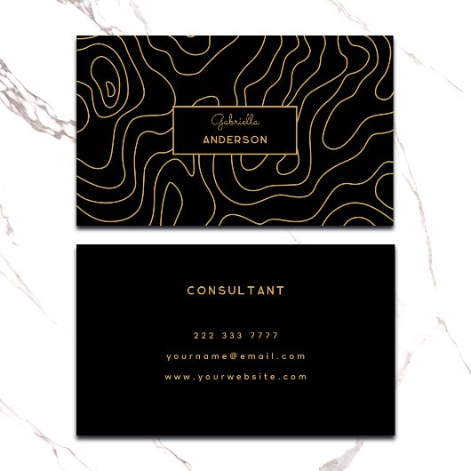 Abstracte gouden lijn patroonmonogram scriptnaam visitekaartje