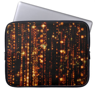 Abstracte gouden regen met heldere deeltjes met ee laptop sleeve