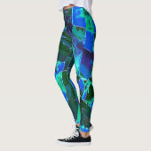 Abstracte groene weidedelen en blauwe hemel, in de leggings (Links)