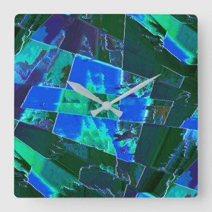 Abstracte groene weidedelen en blauwe hemel, in de vierkante klok