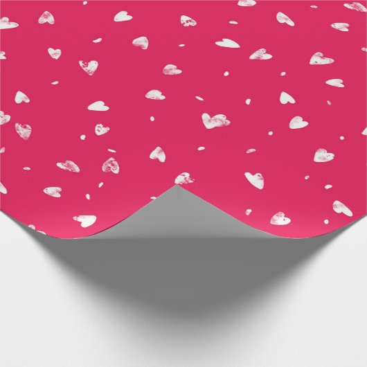 Abstracte harten op rood cadeaupapier (Hoek)