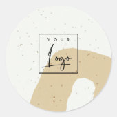 Abstracte keramische okergele gespikkelde vorm log ronde sticker (Voorkant)