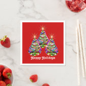 Abstracte kerstbomen ontwerpen op rood servet (Insitu)