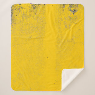 Abstracte kleurrijke gele cementwandtextuur en b sherpa deken