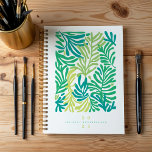 Abstracte kleurrijke tropische bladeren gepersonal planner<br><div class="desc">Verlicht uw planningsroutine met onze opvallende abstracte kleurrijke botanische tropische bladplanner. Met gedurfde, levendige tropische bladeren die samen zijn geweven in een artistiek, abstract ontwerp, is deze planner perfect voor diegenen die houden van een vleugje plezier en creativiteit in hun dagelijkse organisatie. Pas het aan met jouw naam en jaar...</div>