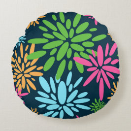 Abstracte kleurrijke vuurwerkbloemen rond kussen