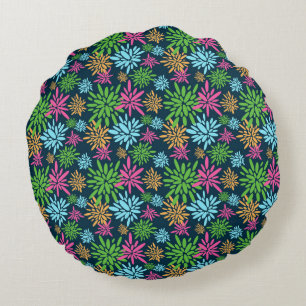 Abstracte kleurrijke vuurwerkbloemen rond kussen
