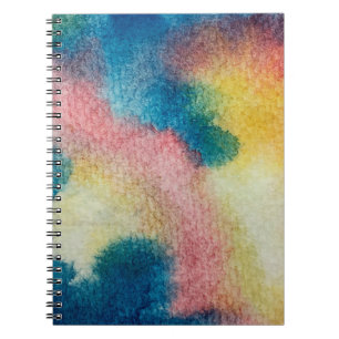 Abstracte kunst van kleurrijke heldere inkt en wat notitieboek