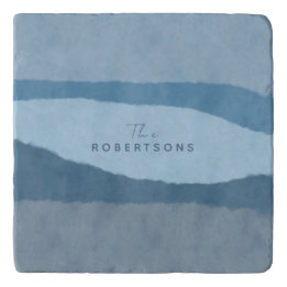 Abstracte kustshadden van blauw trivet