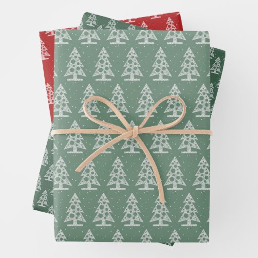 Abstracte lijn kerstbomen op rood en groen inpakpapier vel (In situ)