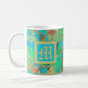 Abstracte monogram groene, gele en blauwe druppels koffiemok