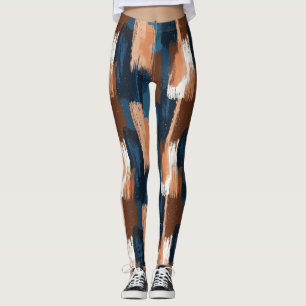 Abstracte penseelstreken in blauw, wit en bruin leggings