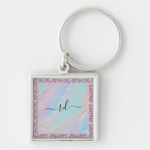 Abstracte regenboogtextuur en roze kristal sleutelhanger