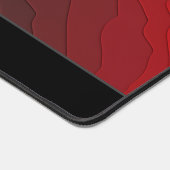 Abstracte rode en zwarte vloeiende vormen en verlo bureaumat (Hoek)