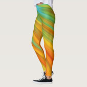 Abstracte rode gele oranje groene strepen op blauw leggings (Links)