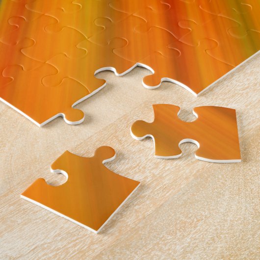 Abstracte rode gele oranje groene strepen op blauw legpuzzel (Zijkant)