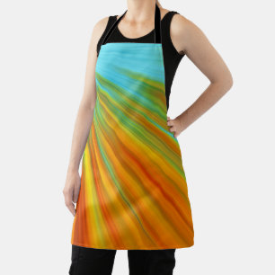 Abstracte rode gele oranje groene strepen op blauw schort
