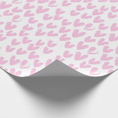 Abstracte roze harten op wit cadeaupapier (Hoek)
