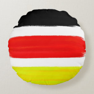 Abstracte schilderkunst met gele rode zwarte kleur rond kussen