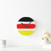 Abstracte schilderkunst met gele rode zwarte kleur ronde klok (Huis)