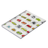 abstracte set kunstobjecten van de pop op een spec notitieboek (Linkerzijde)