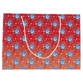 Abstracte sneeuwvlokken met rode en blauwe kerst groot cadeauzakje