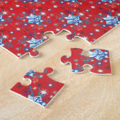 Abstracte sneeuwvlokken met rode en blauwe kerst legpuzzel (Zijkant)