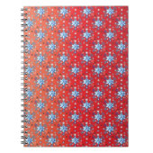 Abstracte sneeuwvlokken met rode en blauwe kerst notitieboek (Voorkant)