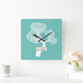 Abstracte witte cirkelboom en noem blauwgroen lich vierkante klok (Huis)