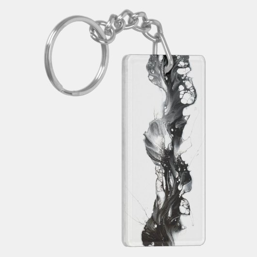Abstracte zwart-witkleurige vlecht sleutelhanger (Voorkant Links)