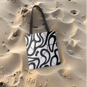 Abstracte zwarte wervelingen op gebroken witte tex tote bag
