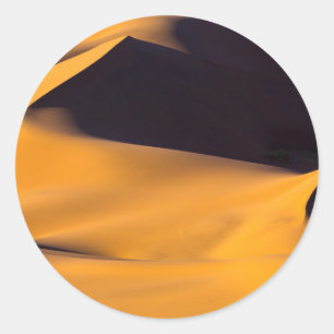 Abstractie van zandduin ronde sticker