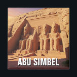 Abu Simbel Egypt Travel Magneet<br><div class="desc">Abu Simbel, een van de meest ontzagwekkende archeologische vindplaatsen van Egypte, is de thuisbasis van twee massieve stenen tempels gebouwd door farao Ramses II in de 13e eeuw v.Chr. Gelegen in de buurt van de Soedanese grens in het zuiden van Egypte, werden deze tempels direct in de berghelling gesneden om...</div>