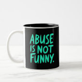 Abuse is not funny tweekleurige koffiemok (Links)