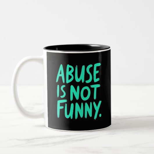 Abuse is not funny tweekleurige koffiemok (Links)