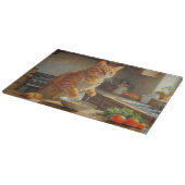 Abyssijnse kat kookt in keuken snijplank (Hoek)