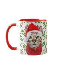 Abyssische kat in een Santa Hat met Holly Kerstmis