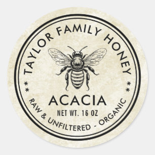 Acaciahoning-etiket met honingbij en vintage uitst ronde sticker