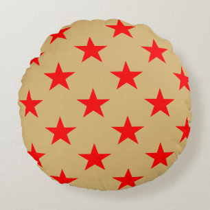 Achtergrond beige en rode sterren rond kussen