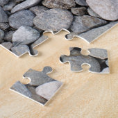 Achtergrond grijze grindsteen legpuzzel (Zijkant)