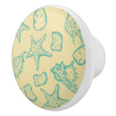 Achtergrond met schelpen. Handtekening 2 Keramische Knop (Rechts)