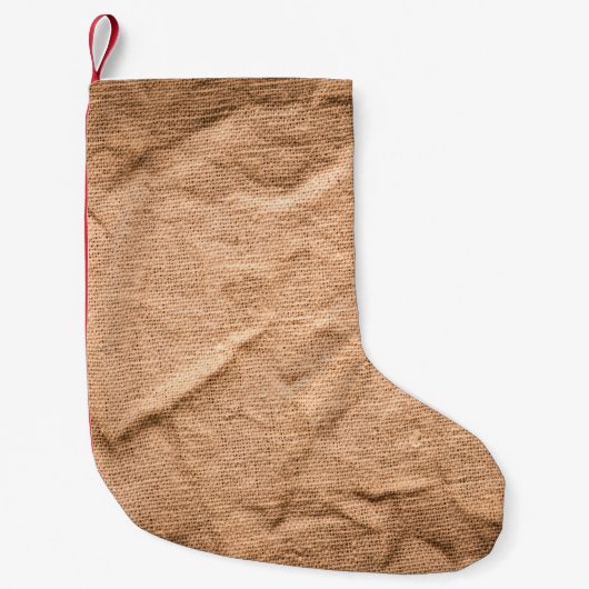Achtergrond oude bruine doek kleine kerstsok (Voorkant)