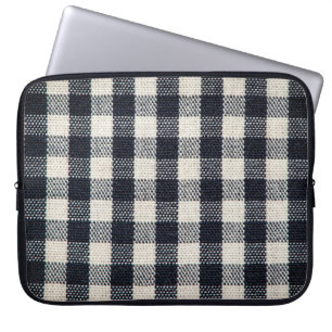 Achtergrond van de textuur van het geplakte katoen laptop sleeve