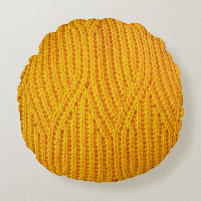 Achtergrond van geel breiswerk rond kussen (Voorkant)