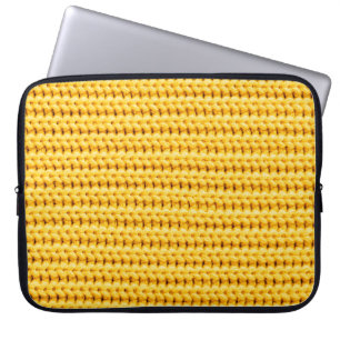 Achtergrond van geel gebreide wollen stof laptop sleeve