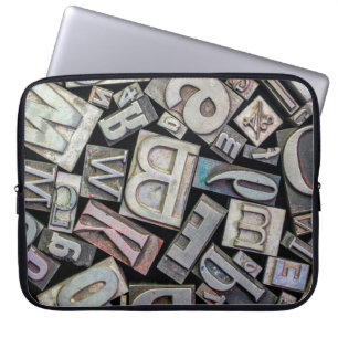 achtergrond van  grijnletterdruk laptop sleeve