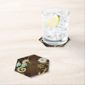 Achtergrond van hout met mechanische zeepaardjes kartonnen onderzetters (Insitu)